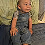 Faust joined the competition — help win amazing prizes! baby, child, denim_overalls, striped_shirt, barefoot, bed, pillow, green_pillow, gray_bedspread, indoor, sitting, cute, smiling, infant, person, skin, face, head, hand, foot