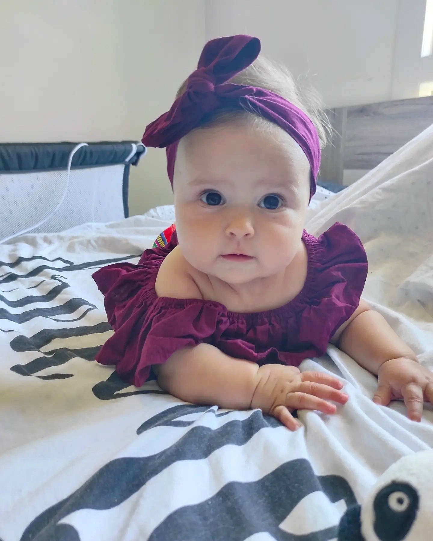 Gioia participe au concours pour gagner de l'argent avec cette photo : baby, baby_toddler_clothing, comfort, cool, dress, eyelash, face, facial_expression, hairstyle, happy, headband, linens, magenta, person, pink, purple, skin, sleeve, textile, toddler