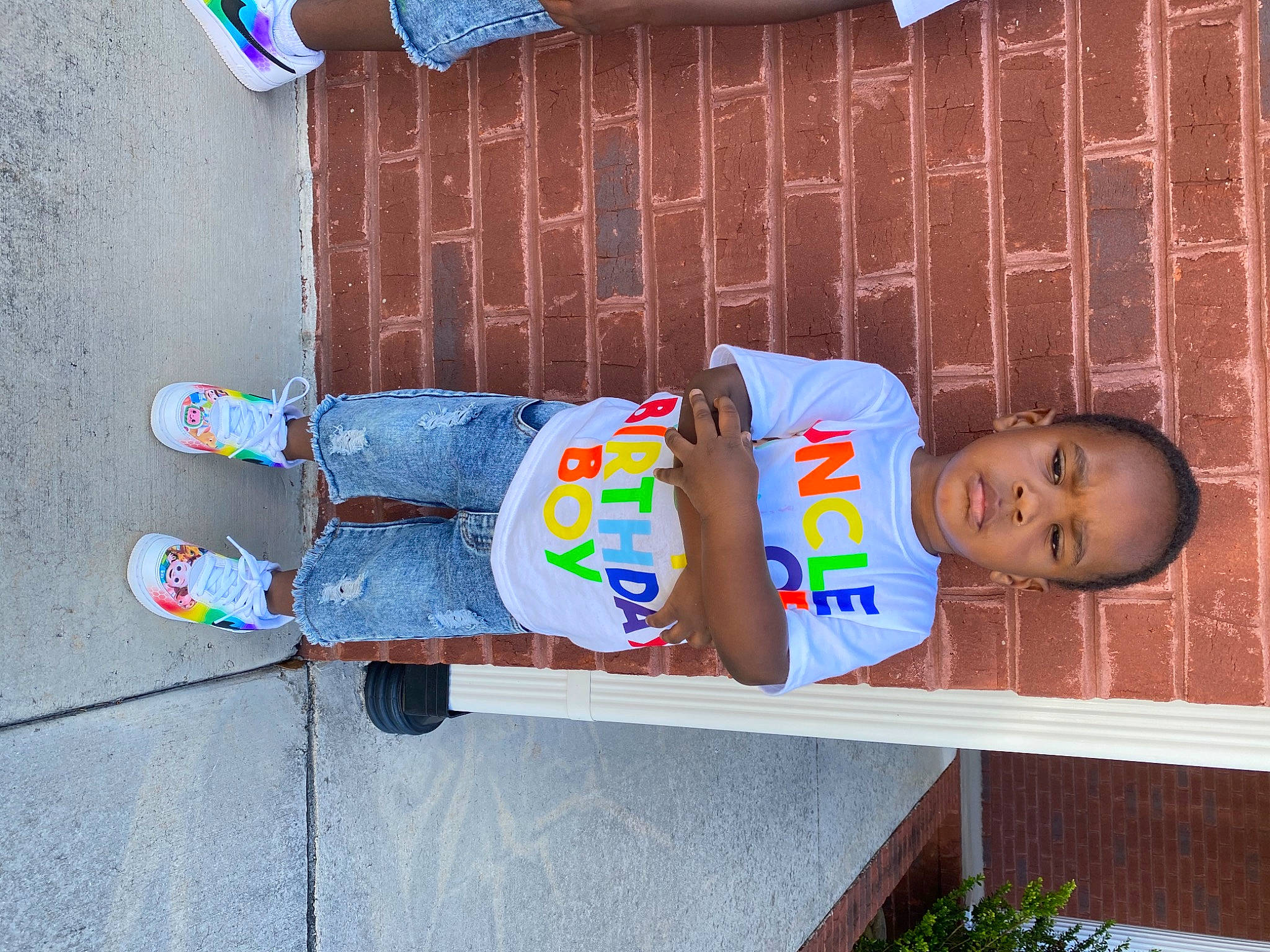 Zymere Hartsell is registered to the contest to win money with this photo: baby_toddler_clothing, blue, child, concrete, denim, design, electric_blue, fun, hat, human_leg, jeans, leg, leisure, person, sandal, t_shirt, thigh, toddler, walking_shoe, wood