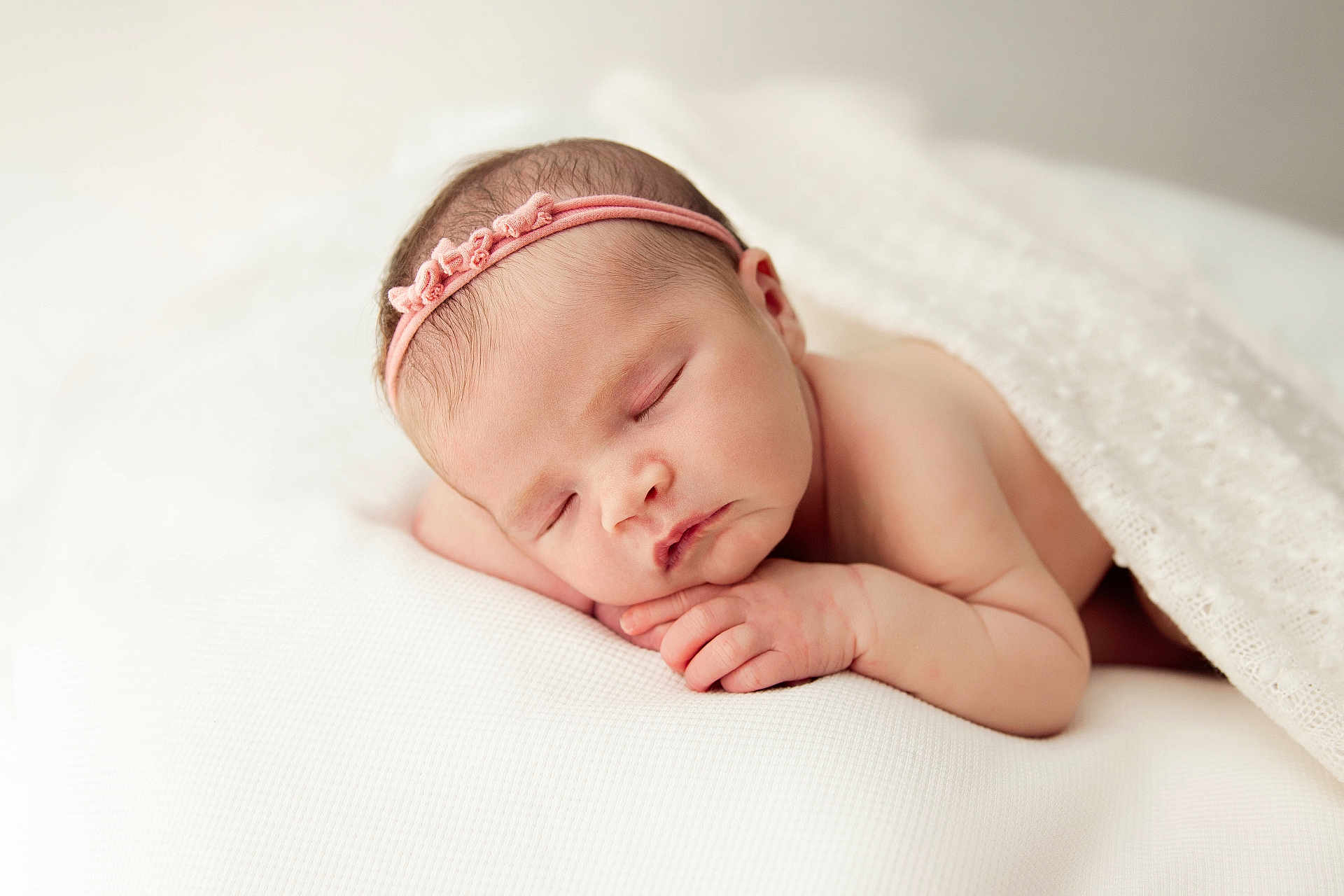 Harriet joined the competition — help win amazing prizes! newborn, baby, sleeping, headband, pink, blanket, white_background, infant, cute, peaceful, soft, portrait, closeup, skin, hand, face, rest, cozy, toddler, child
