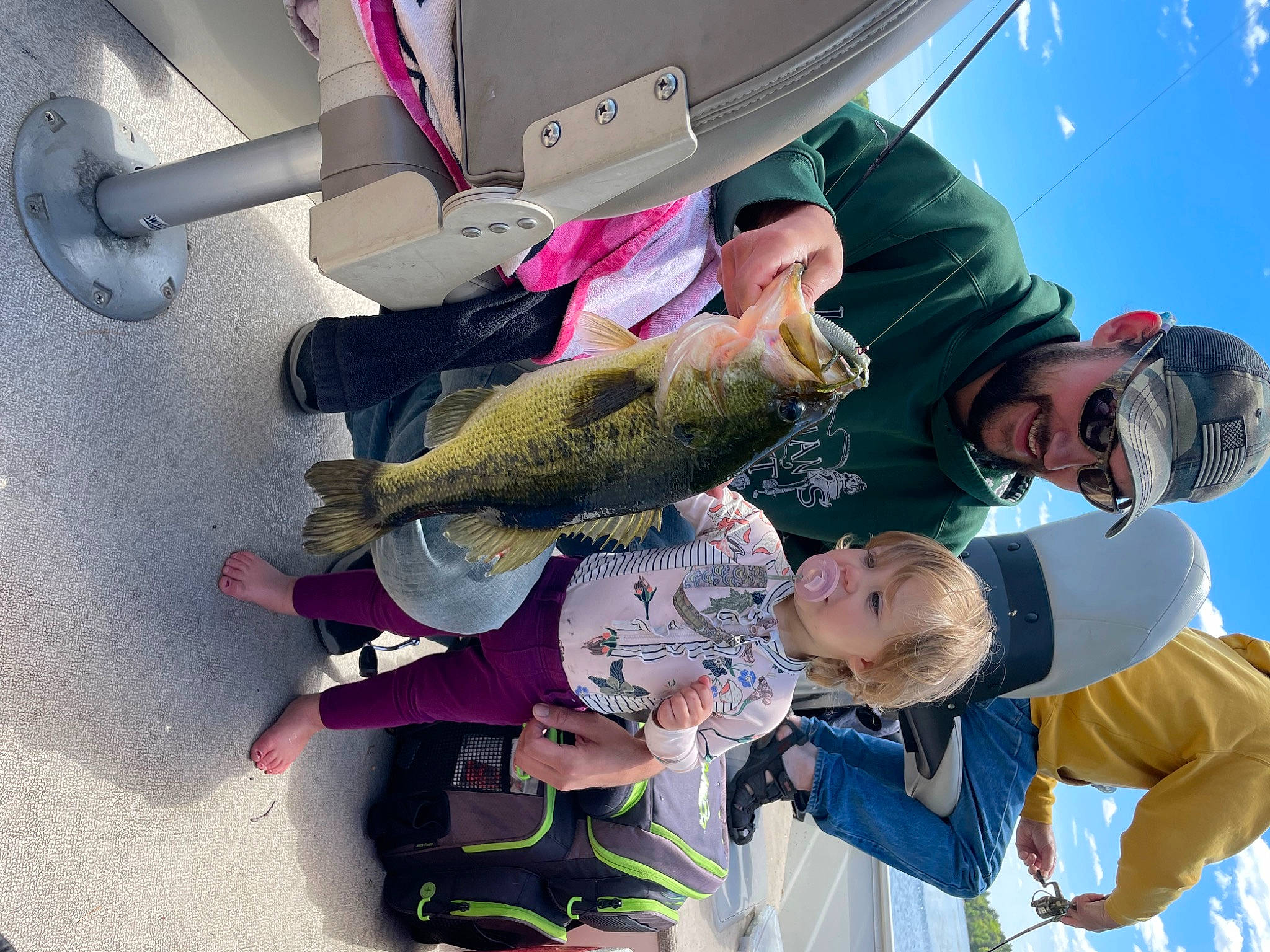 Haylee is registered to the contest to win money with this photo: baseball_cap, child, fin, fish, fishing, fun, goggles, happy, hat, headwear, joy, leisure, person, ray_finned_fish, recreation, recreational_fishing, sky, smile, sunglasses, toddler
