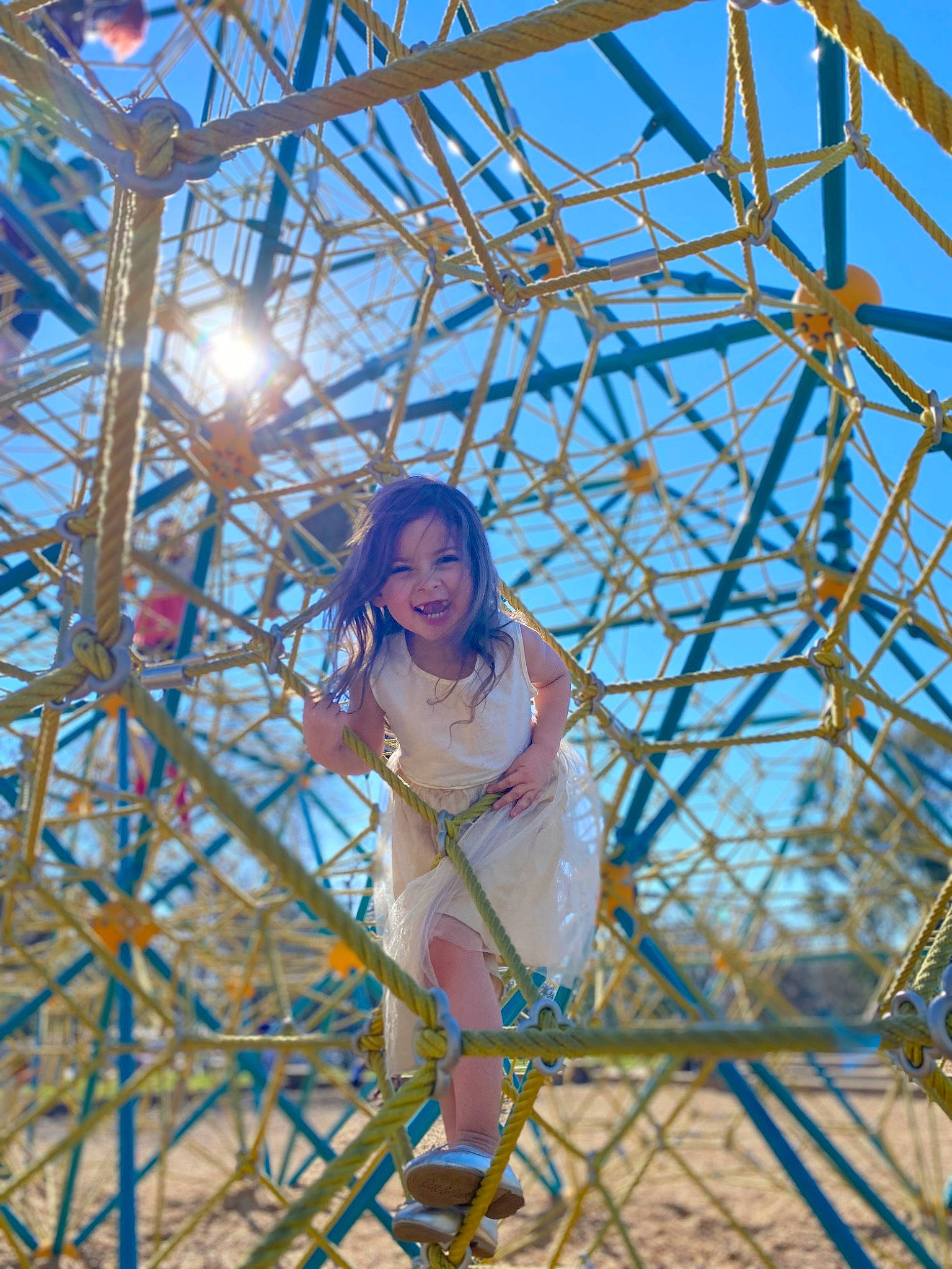 Alysia joined the competition — help win amazing prizes! beauty, city, daylighting, electric_blue, electrical_supply, electricity, fun, happy, joy, landmark, leisure, metal, person, plant, recreation, sky, spring, symmetry, t_shirt, toddler