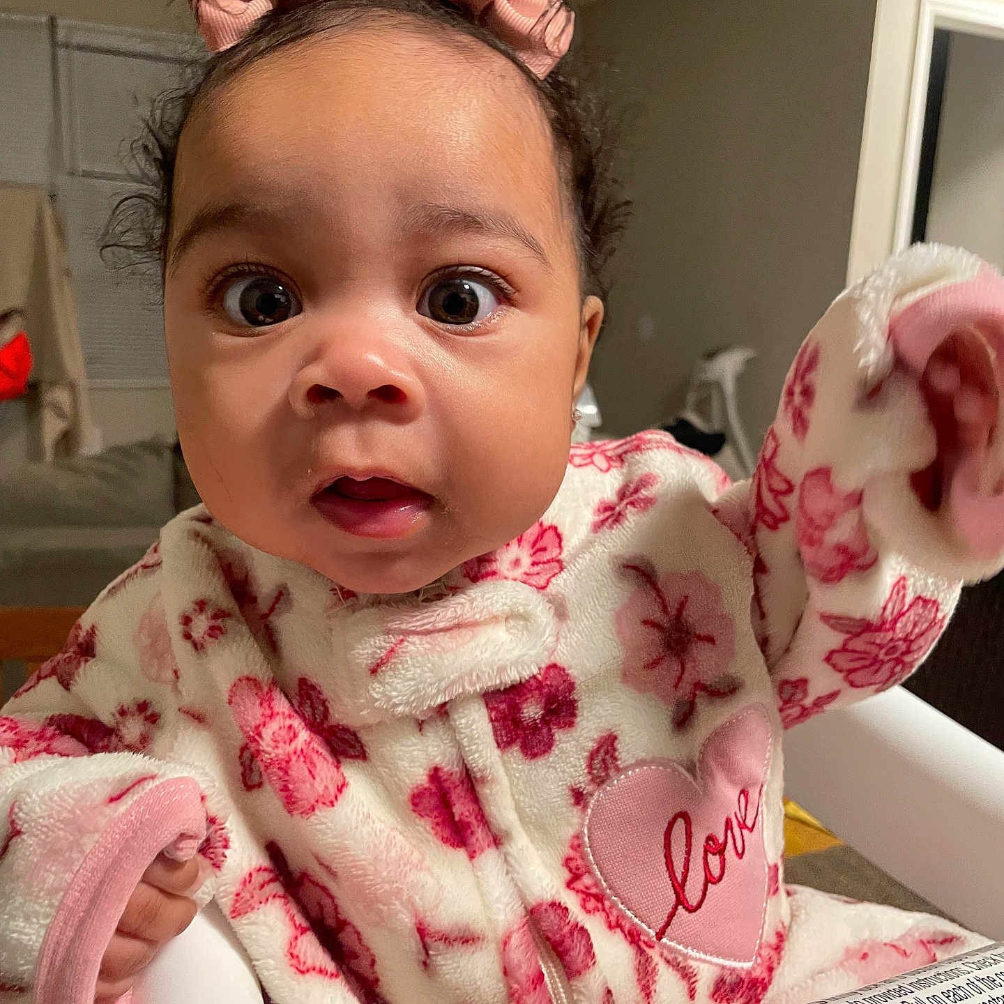 Jaylanhi joined the competition — help win amazing prizes! baby, child, clothing, cozy, curious, cute, face, fleece, floral_outfit, heart_patch, high_chair, home, indoors, infant, love, person, pink_bows, portrait, sitting, wide_eyes