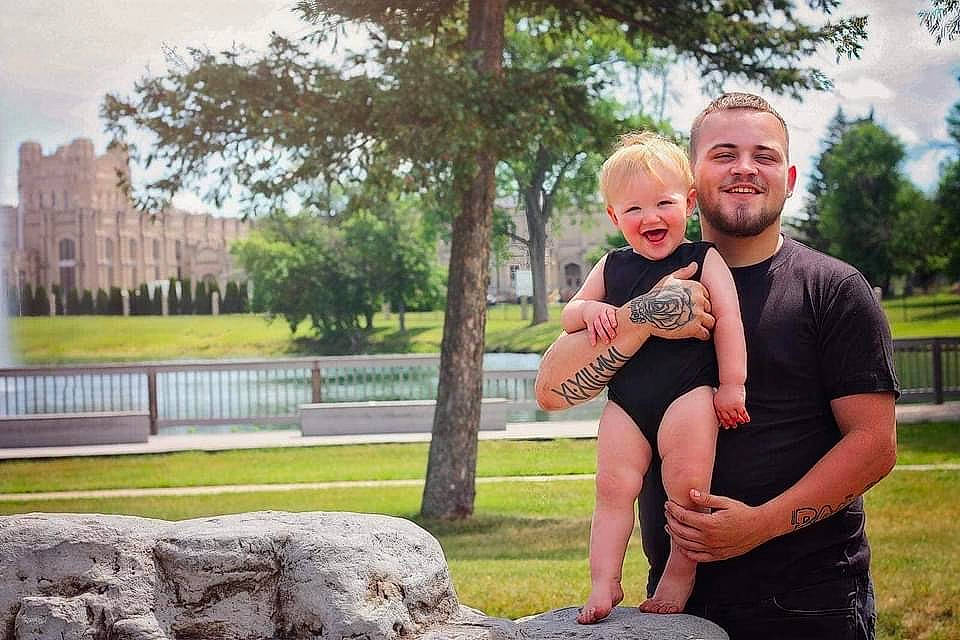 Royce is registered to the contest to win money with this photo: baby, beauty, building, child, event, fun, grass, happy, joy, lawn, leisure, people_in_nature, person, plant, recreation, sitting, sky, smile, summer, t_shirt