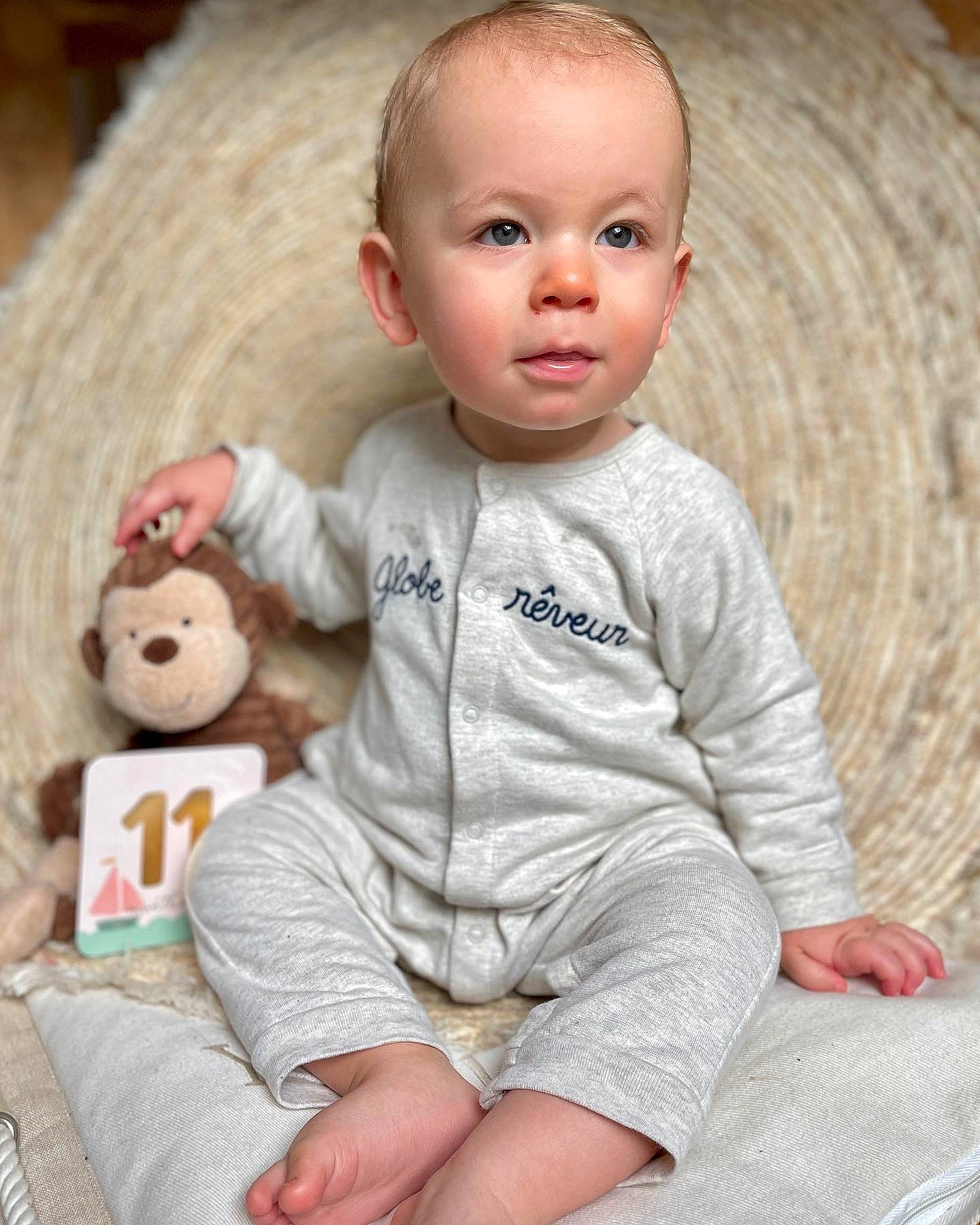 Ethan participe au concours pour gagner de l'argent avec cette photo : baby_toddler_clothing, cheek, comfort, eye, hairstyle, happy, leg, mammal, nose, organ, outerwear, person, pink, product, skin, sleeve, smile, textile, toy, white