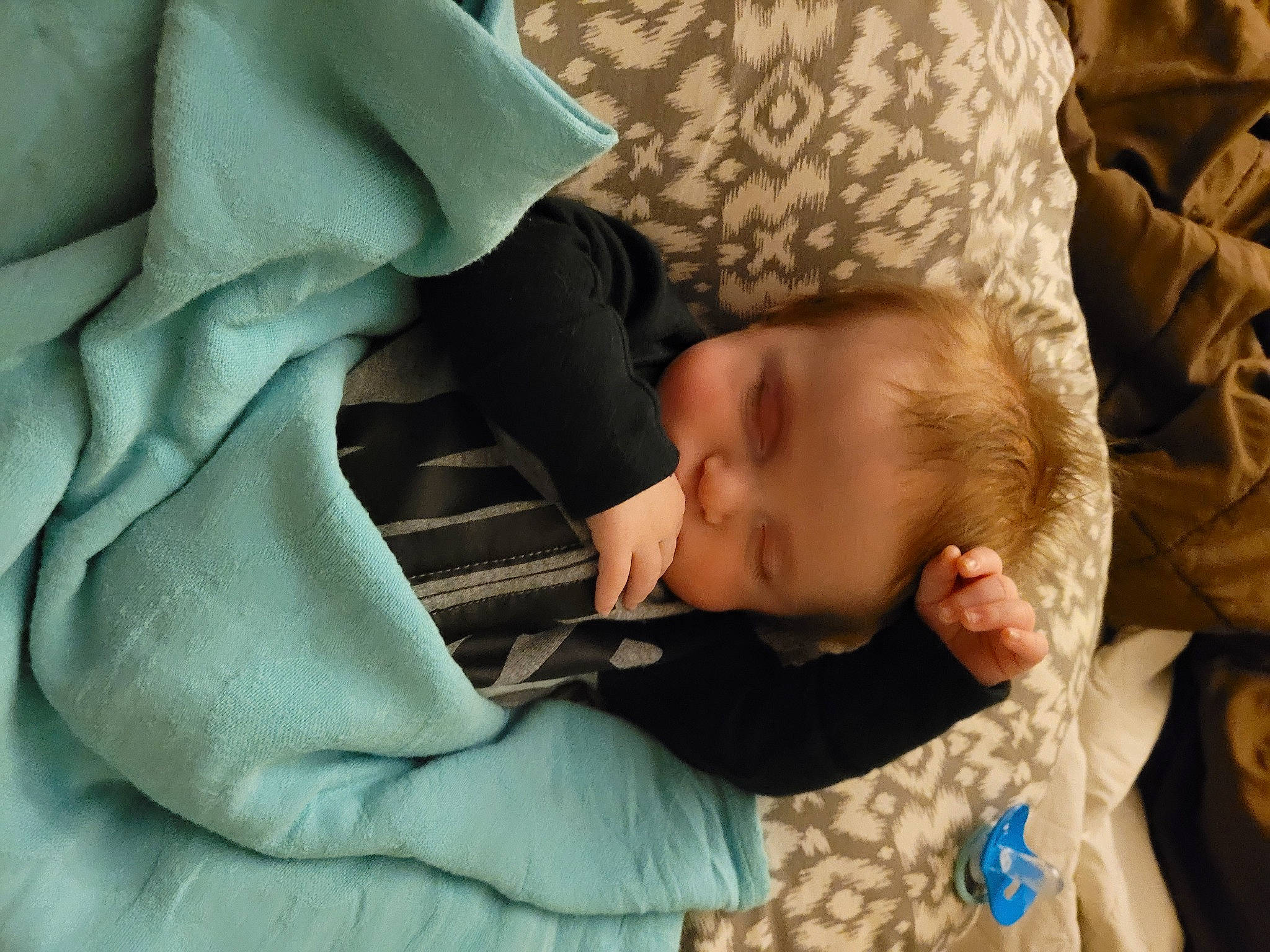 Karson is registered to the contest to win money with this photo: baby, baby_products, baby_toddler_clothing, bedtime, cheek, child, comfort, gesture, linens, mammal, nap, person, product, sitting, skin, sleep, sleeve, toddler, tree, vertebrate