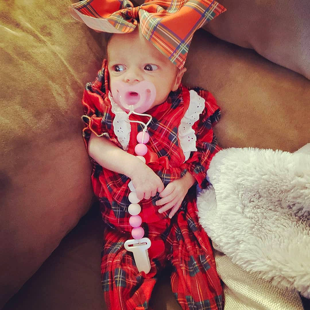 Loretta joined the competition — help win amazing prizes! baby, beauty, child, child_model, design, dress, ear, eye, fashion_accessory, hand, happy, head, headwear, organ, pattern, person, photography, red, smile, tartan