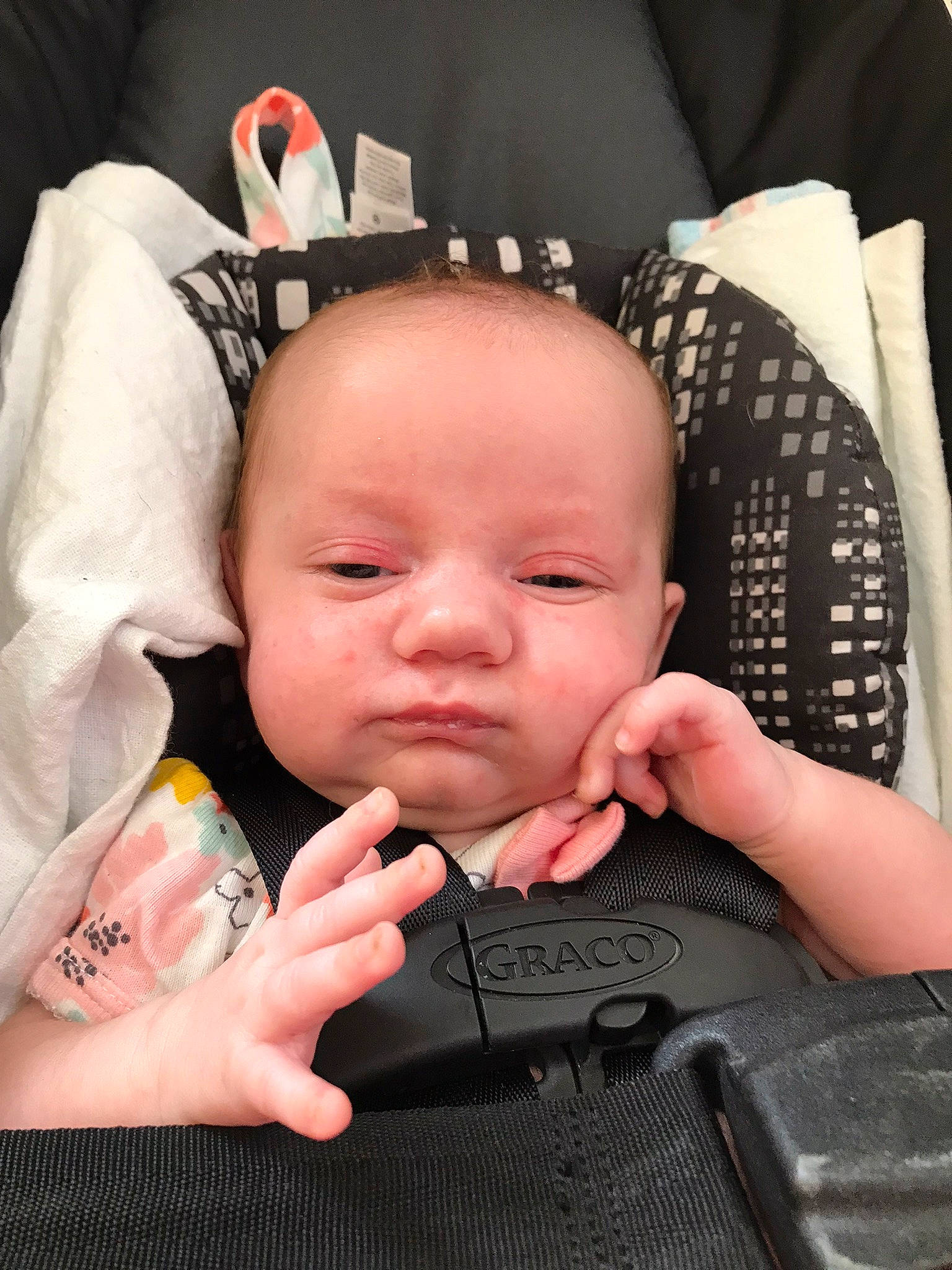 Reagan is registered to the contest to win money with this photo: baby, baby_sleeping, baby_toddler_clothing, black, cheek, chin, comfort, eyebrow, eyelash, finger, gesture, hand, human, mouth, nose, person, photograph, product, skin, sleeve