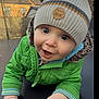 baby, beanie, bodypart, bonnet, cap, clothing, face, finger, hand, happy, hat, head, hood, knitwear, person, photography, playarea, portrait, sweater, sweatshirt