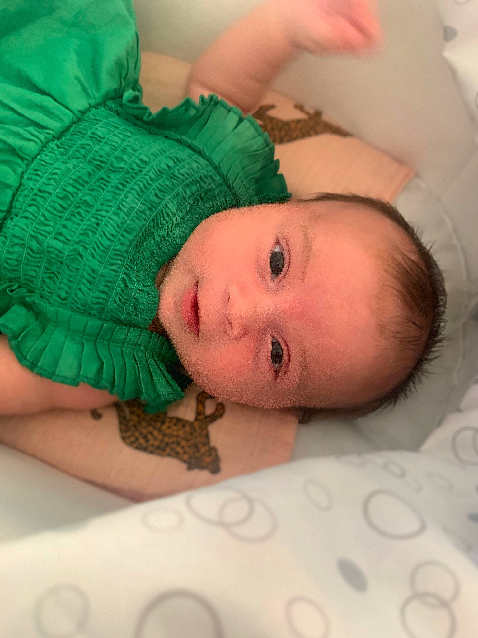 Loucia participe au concours pour gagner de l'argent avec cette photo : abdomen, baby, baby_products, baby_safety, baby_toddler_clothing, cheek, child, comfort, eye, eyebrow, eyelash, facial_expression, head, iris, linens, mouth, pattern, person, room, skin