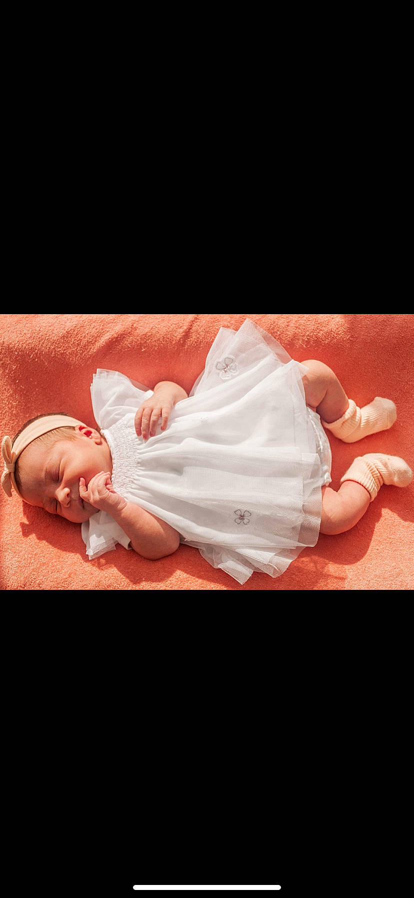 Loucia participe au concours pour gagner de l'argent avec cette photo : baby, baby_sleeping, baby_toddler_clothing, comfort, dress, flash_photography, foot, gesture, hand, happy, headgear, leg, lip, nail, person, petal, pink, sleeve, thigh, thumb