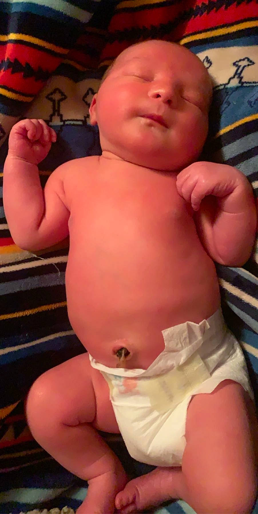 Nathan is registered to the contest to win money with this photo: abdomen, arm, baby, cheek, chest, child, muscle, person, stomach, thumb, toddler, trunk