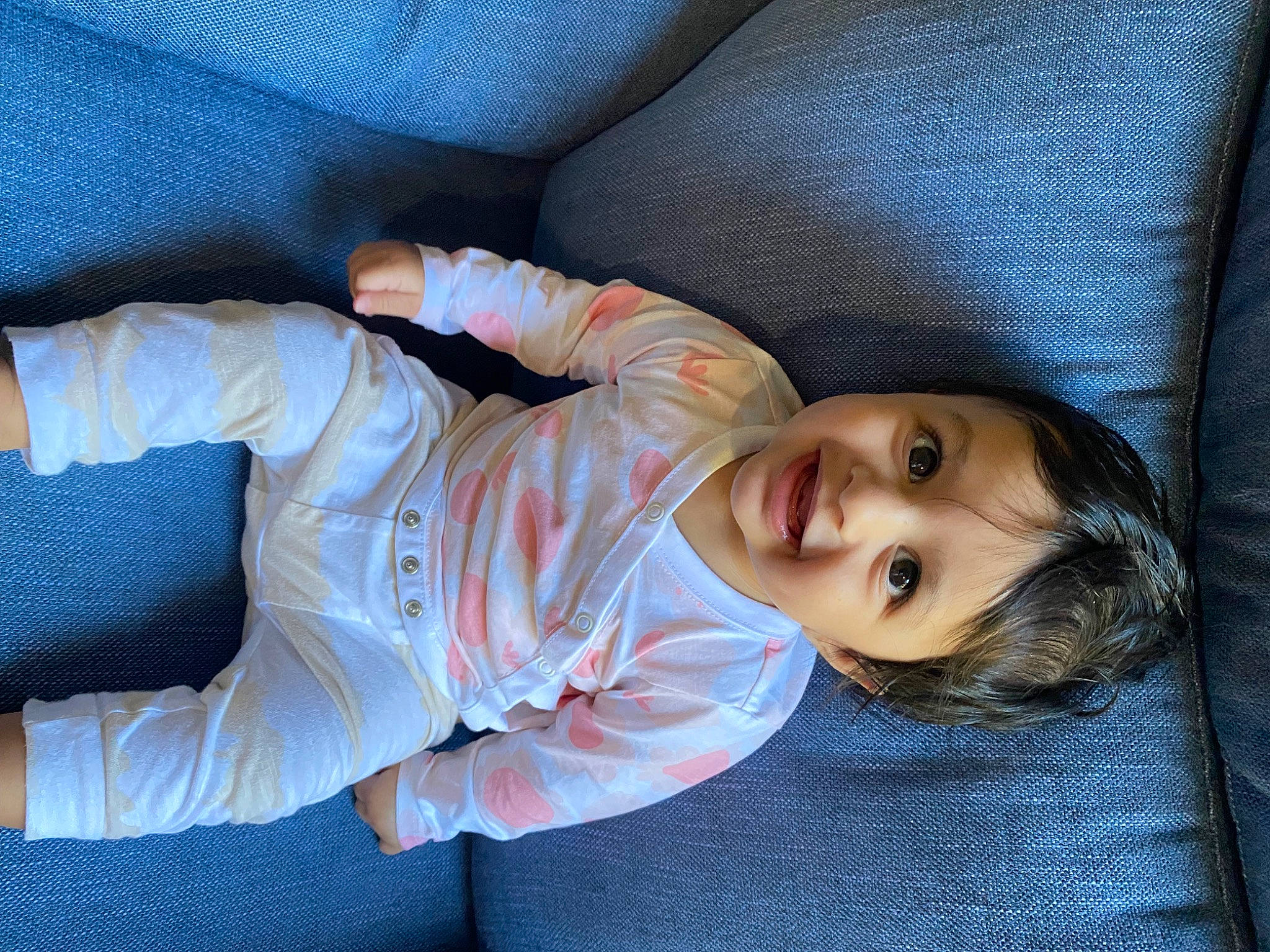 Shanaya joined the competition — help win amazing prizes! baby_toddler_clothing, cheek, child, chin, comfort, denim, electric_blue, flash_photography, happy, human_leg, iris, lip, nose, person, portrait_photography, sitting, sleeve, smile, textile, toddler