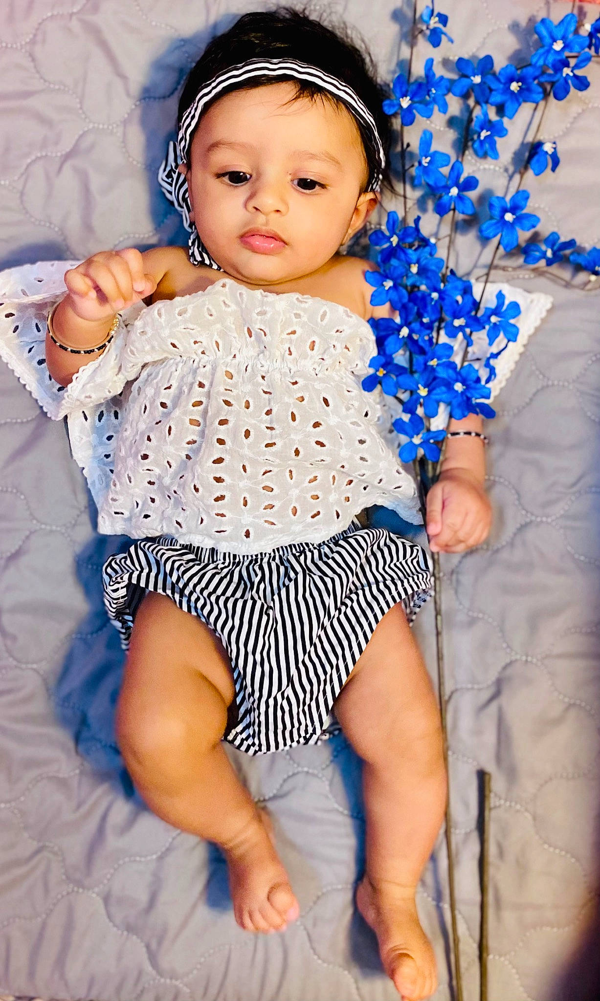 Shanaya joined the competition — help win amazing prizes! arm, baby, baby_toddler_clothing, blue, cool, electric_blue, finger, gesture, hairstyle, hand, happy, headgear, headwear, organ, person, skin, sleeve, thigh, toddler, trunk