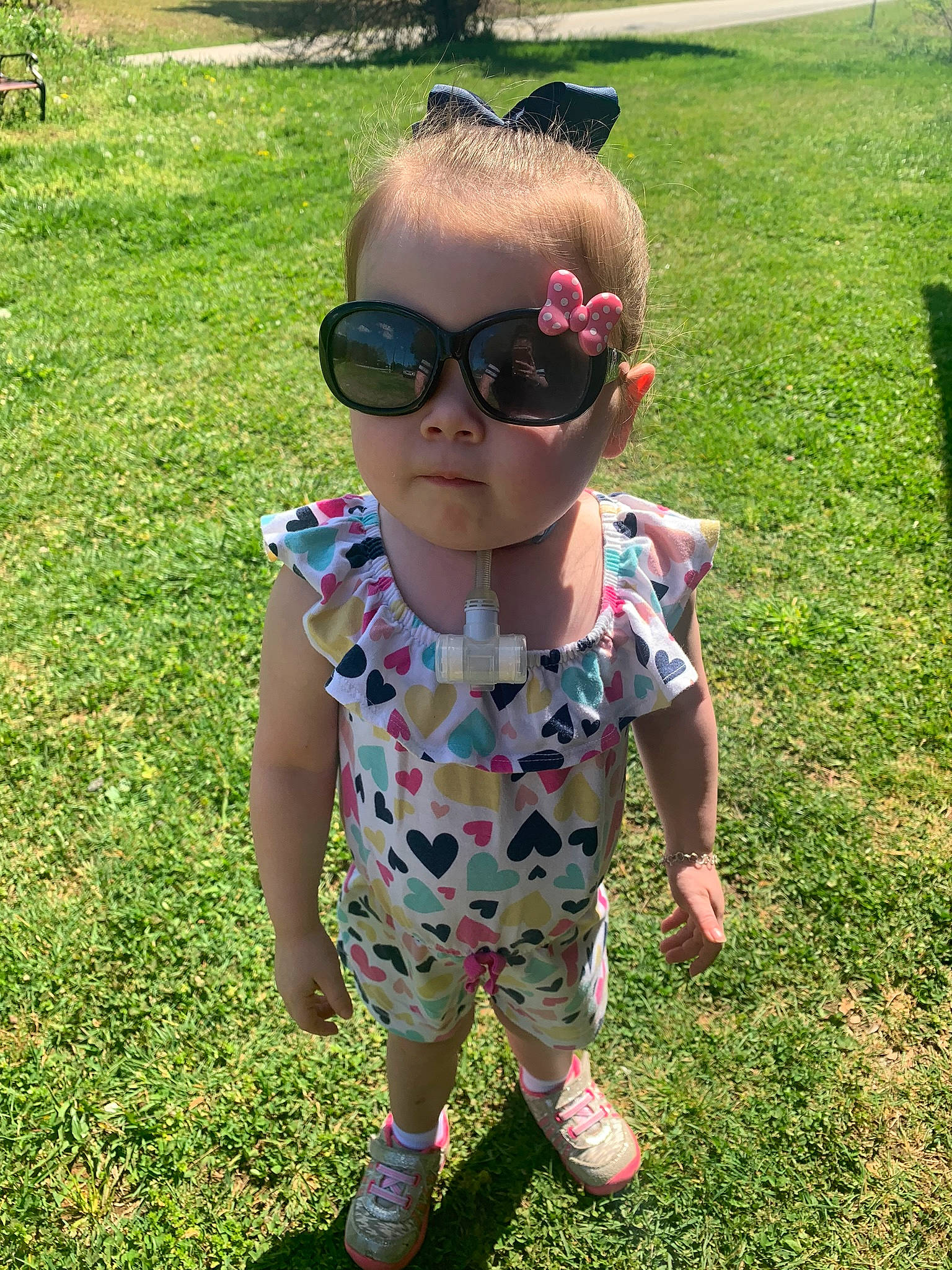 Addyson joined the competition — help win amazing prizes! child, cool, eyewear, fawn, fun, glasses, grass, lawn, leaf, pattern, person, personal_protective_equipment, plant, skin, smile, summer, sunglasses, t_shirt, toddler, vacation