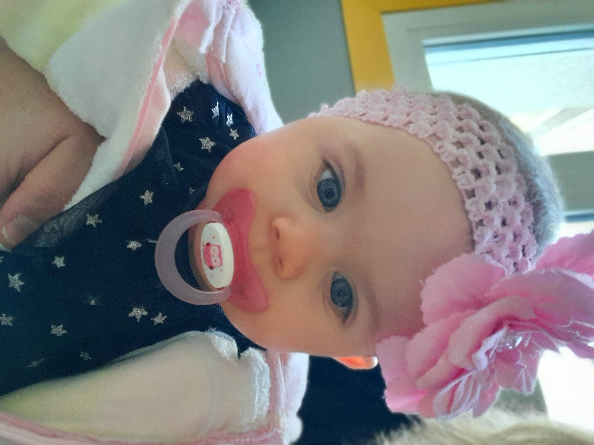 Eleanna participe au concours pour gagner de l'argent avec cette photo : baby, baby_products, baby_toddler_clothing, cap, cheek, child, chin, eyebrow, eyelash, happy, headgear, headwear, lip, nose, person, pink, product, skin, sleeve, textile