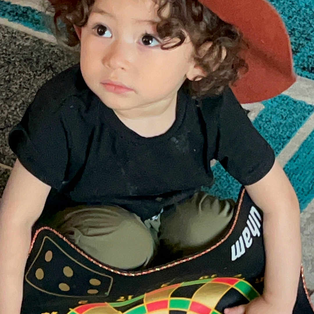 Emrys-Jaxon joined the competition — help win amazing prizes! boy, child, clothing, costume, darts, face, game, hat, head, lady, machine, male, nightlife, person, photography, portrait, sunhat, t_shirt, urban, wheel