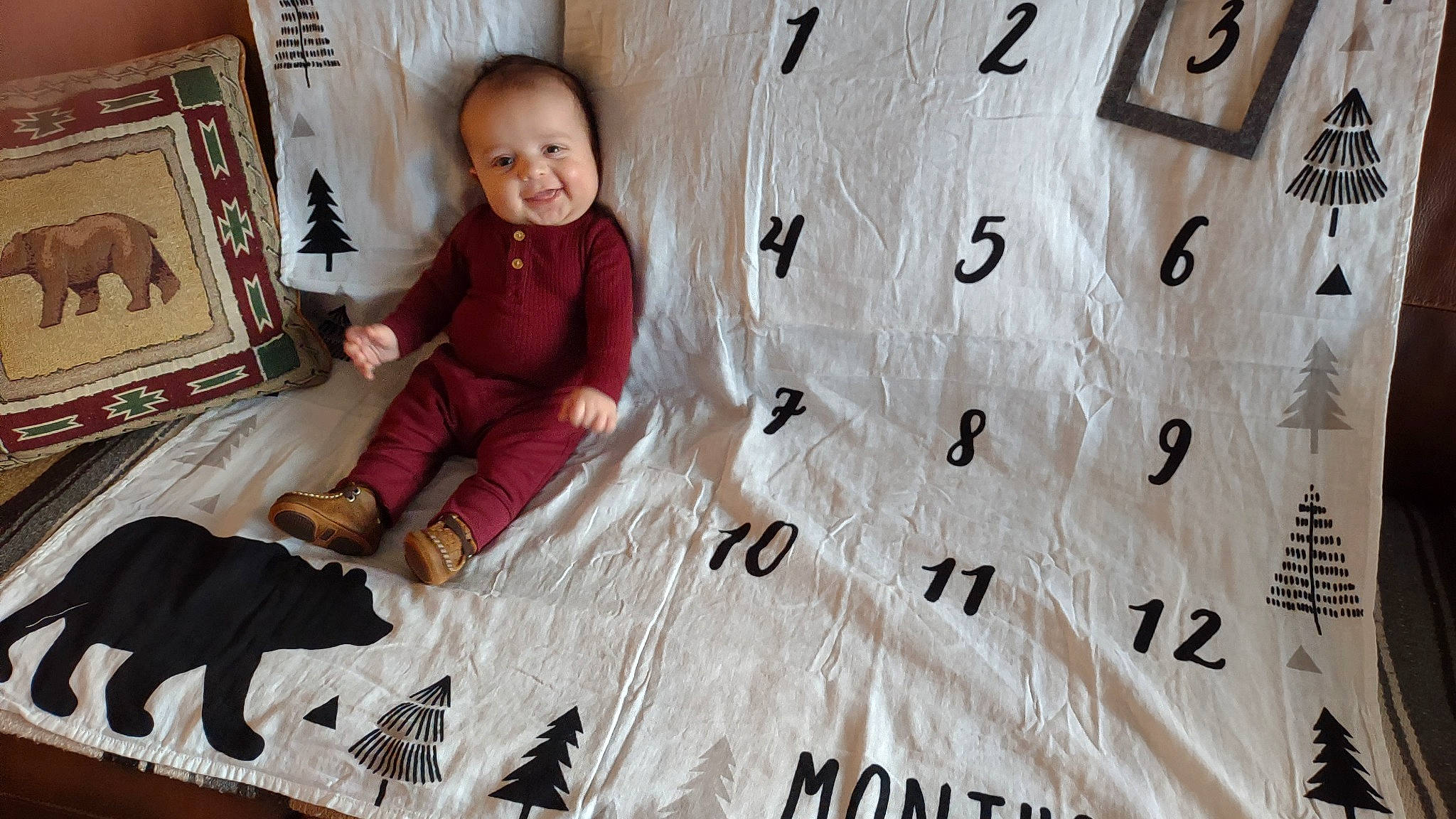 Uriel joined the competition — help win amazing prizes! comfort, design, floor, flooring, font, happy, hardwood, leisure, linens, pattern, person, product, room, sitting, smile, t_shirt, textile, toddler, tree, wall