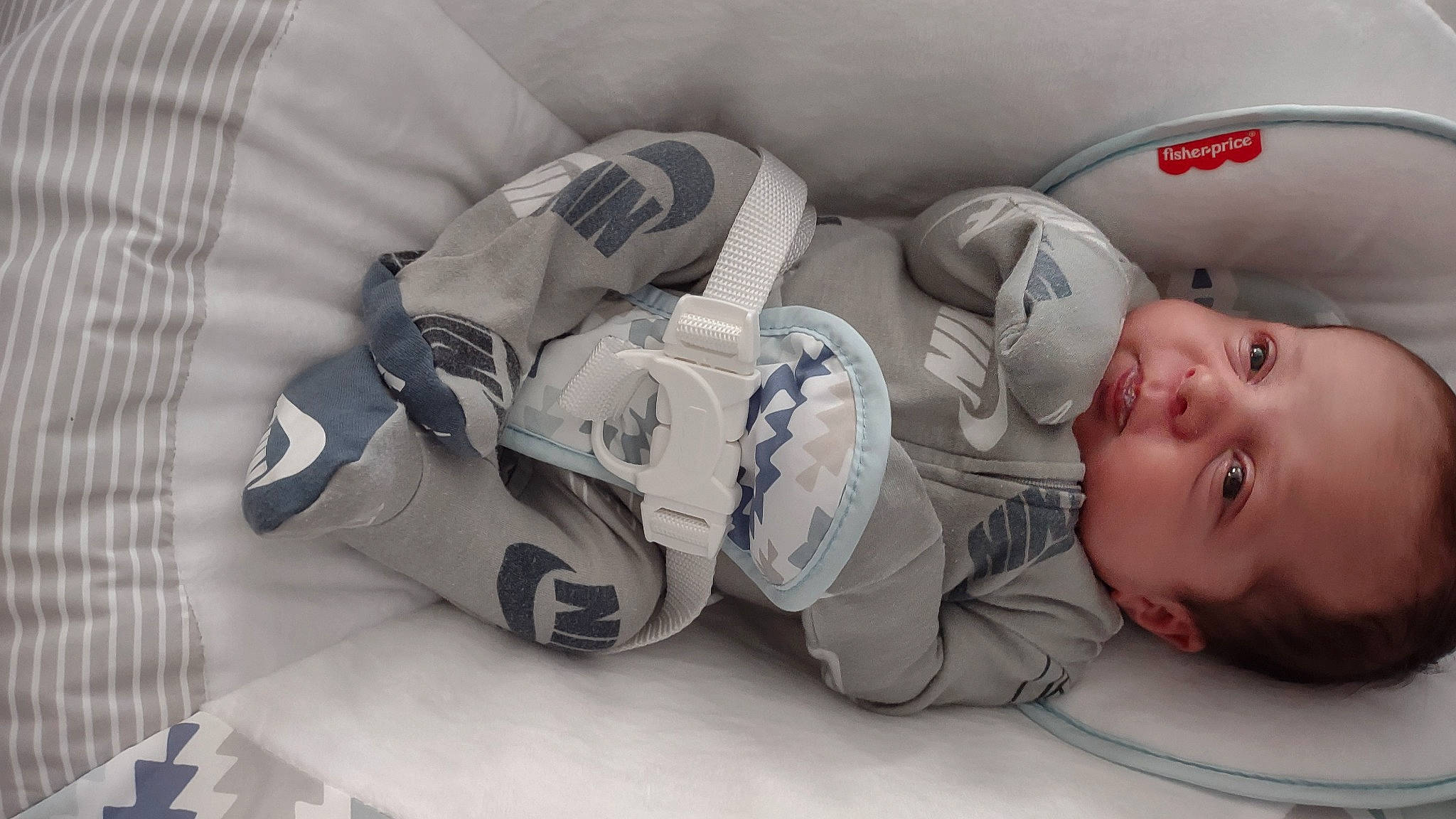 Uriel joined the competition — help win amazing prizes! automotive_design, baby, baby_toddler_clothing, carmine, child, comfort, flooring, font, pattern, person, personal_protective_equipment, plastic, room, sleeve, smile, toddler, white