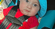 Woody joined the competition — help win amazing prizes! baby, baby_face, blue_hat, car, car_seat, child, child_seat, closeup, cute, expression, hat, indoors, infant, portrait, red_clothing, safety, seatbelt, skin, soft_light, young_child