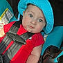 Woody joined the competition — help win amazing prizes! baby, infant, car_seat, hat, blue_hat, red_clothing, child, seatbelt, safety, cute, portrait, indoors, closeup, child_seat, baby_face, expression, soft_light, skin, young_child, car