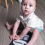 Tommy joined the competition — help win amazing prizes! arm, baby, babycrawling, bodypart, clothing, crawling, face, hardwood, head, number, pants, person, photography, portrait, sitting, sleeve, symbol, t_shirt, text, wood