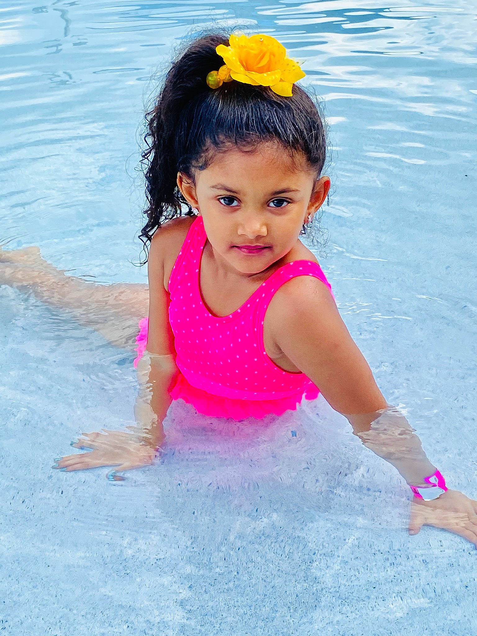Adia Dewan is registered to the contest to win money with this photo: child, fun, happy, headgear, leisure, person, pink, play, recreation, skin, smile, summer, swimming_pool, swimwear, toddler, vacation, water