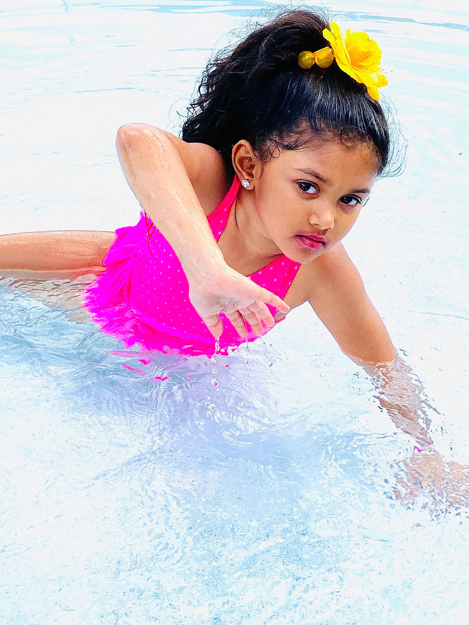 Adia Dewan is registered to the contest to win money with this photo: ballet_tutu, beauty, child, child_model, costume, dress, happy, leisure, person, photo_shoot, photography, pink, play, recreation, sportswear, swimming_pool, toddler, water