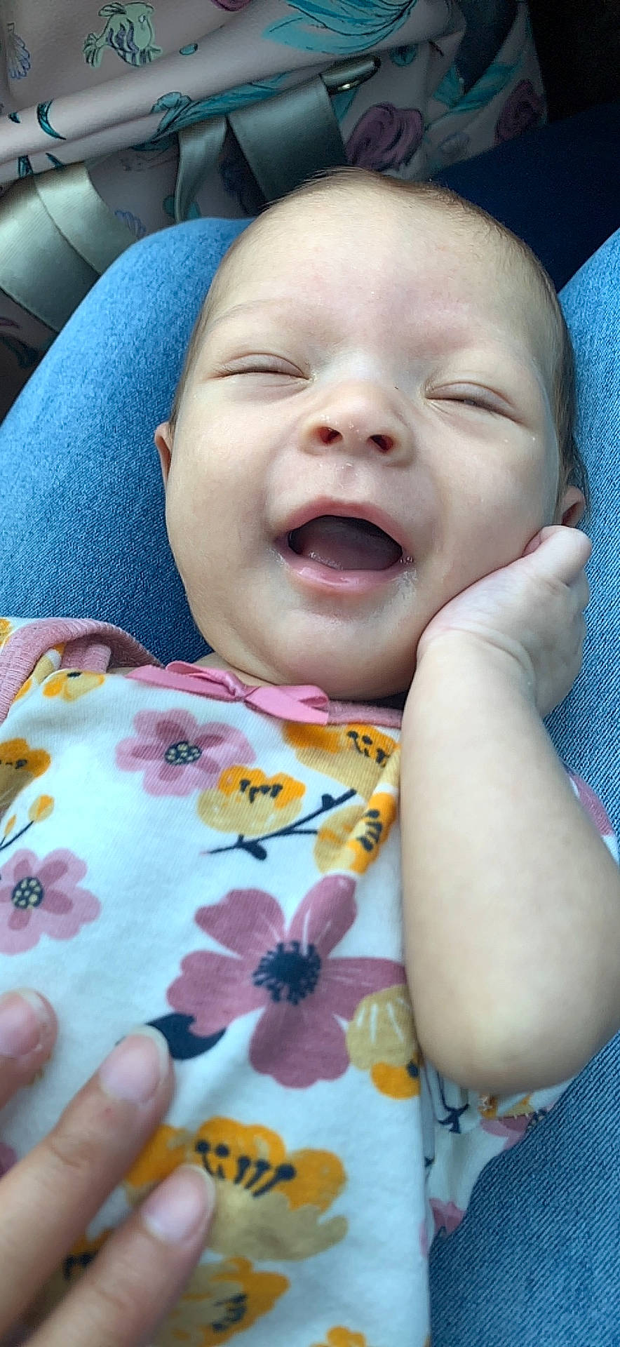 Felicity is registered to the contest to win money with this photo: baby, baby_toddler_clothing, cheek, chin, comfort, eyebrow, face, finger, gesture, happy, iris, lip, mouth, neck, nose, person, pink, skin, smile, toddler