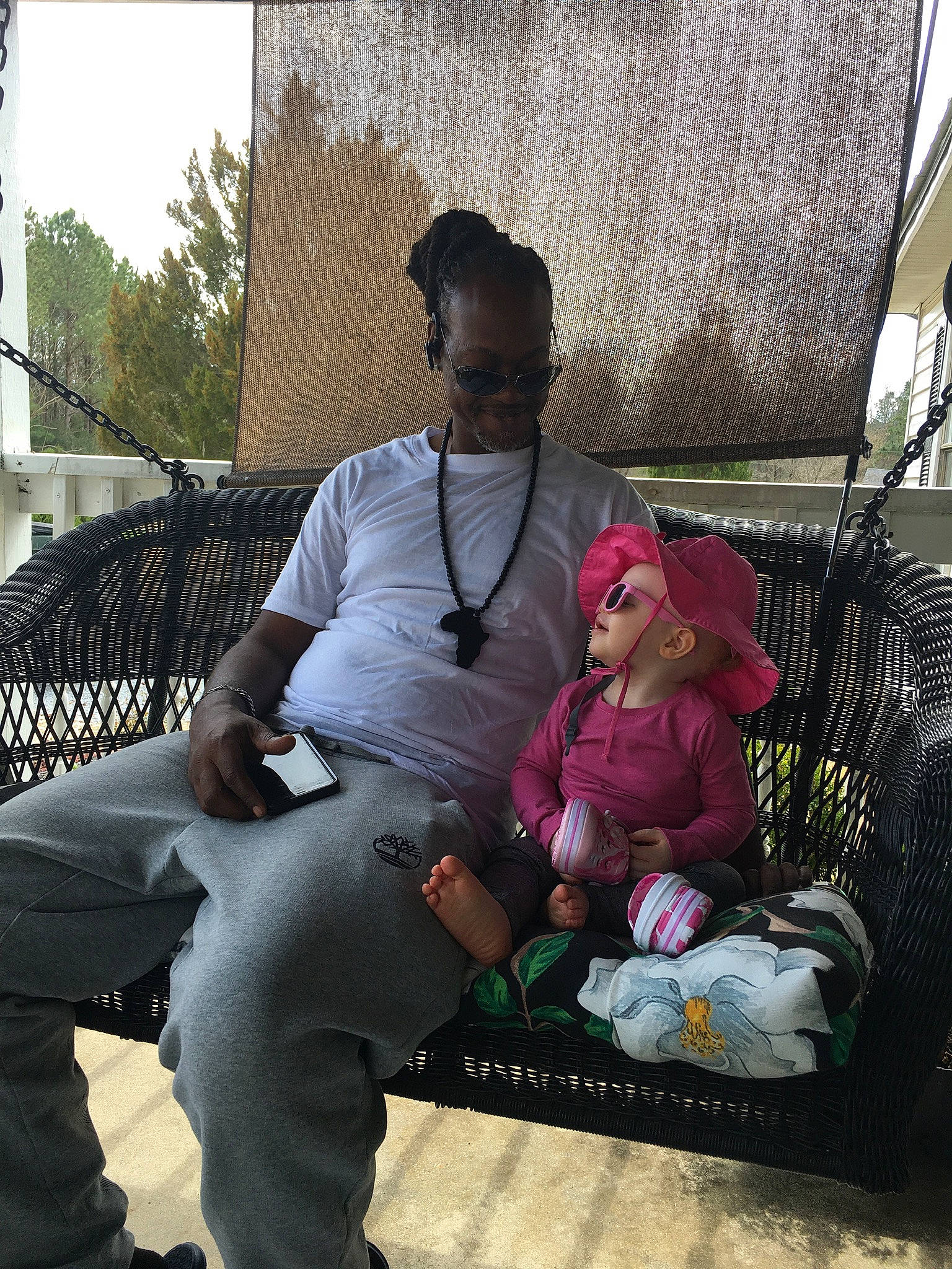 Kaniya joined the competition — help win amazing prizes! bag, boot, child, comfort, event, eyewear, fashion, fun, grass, hat, headwear, joy, lap, leg, leisure, luggage_and_bags, person, recreation, sitting, t_shirt