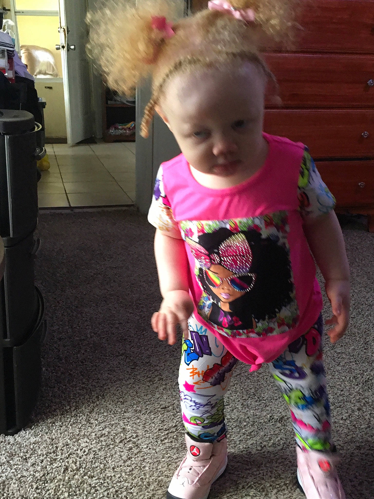 Kaniya is registered to the contest to win money with this photo: active_pants, baby_toddler_clothing, child, cool, dress, eyewear, fun, hair, hairstyle, happy, head, joint, magenta, pattern, person, pink, sleeve, sportswear, standing, t_shirt