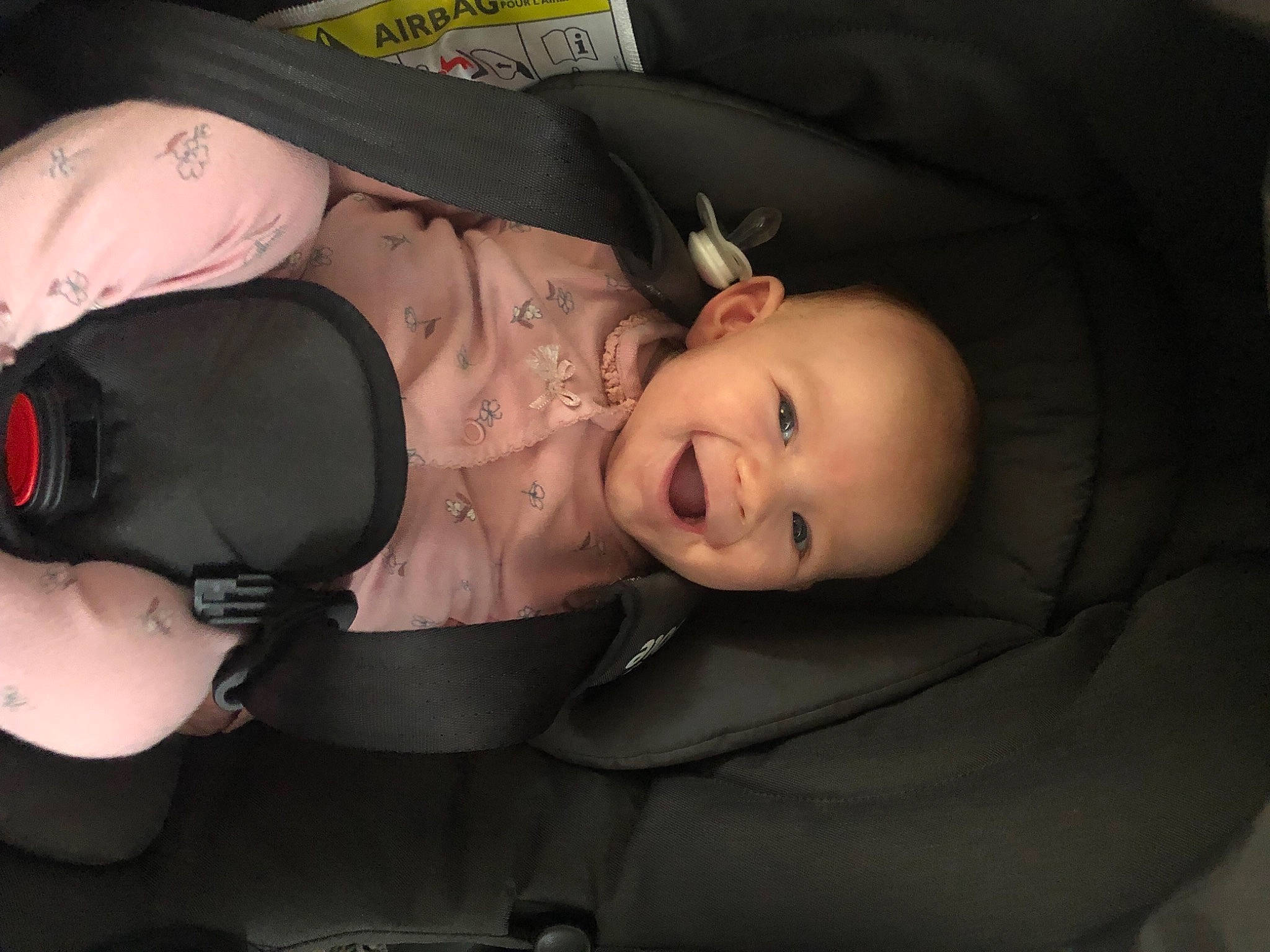 Gracie-mae is registered to the contest to win money with this photo: auto_part, baby, baby_carriage, baby_products, baby_toddler_clothing, car_seat, cheek, chest, comfort, eyelash, flash_photography, fun, glove, helmet, joy, lip, mouth, person, personal_protective_equipment, skin