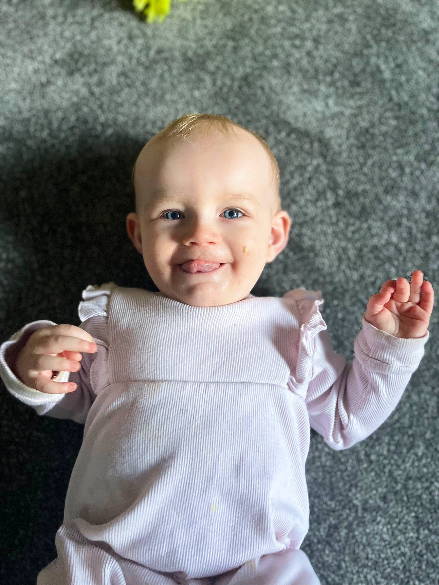 Gracie-mae is registered to the contest to win money with this photo: arm, baby, baby_toddler_clothing, cheek, chin, eye, face, facial_expression, finger, gesture, hand, happy, human_body, iris, joy, lip, nose, person, pink, skin