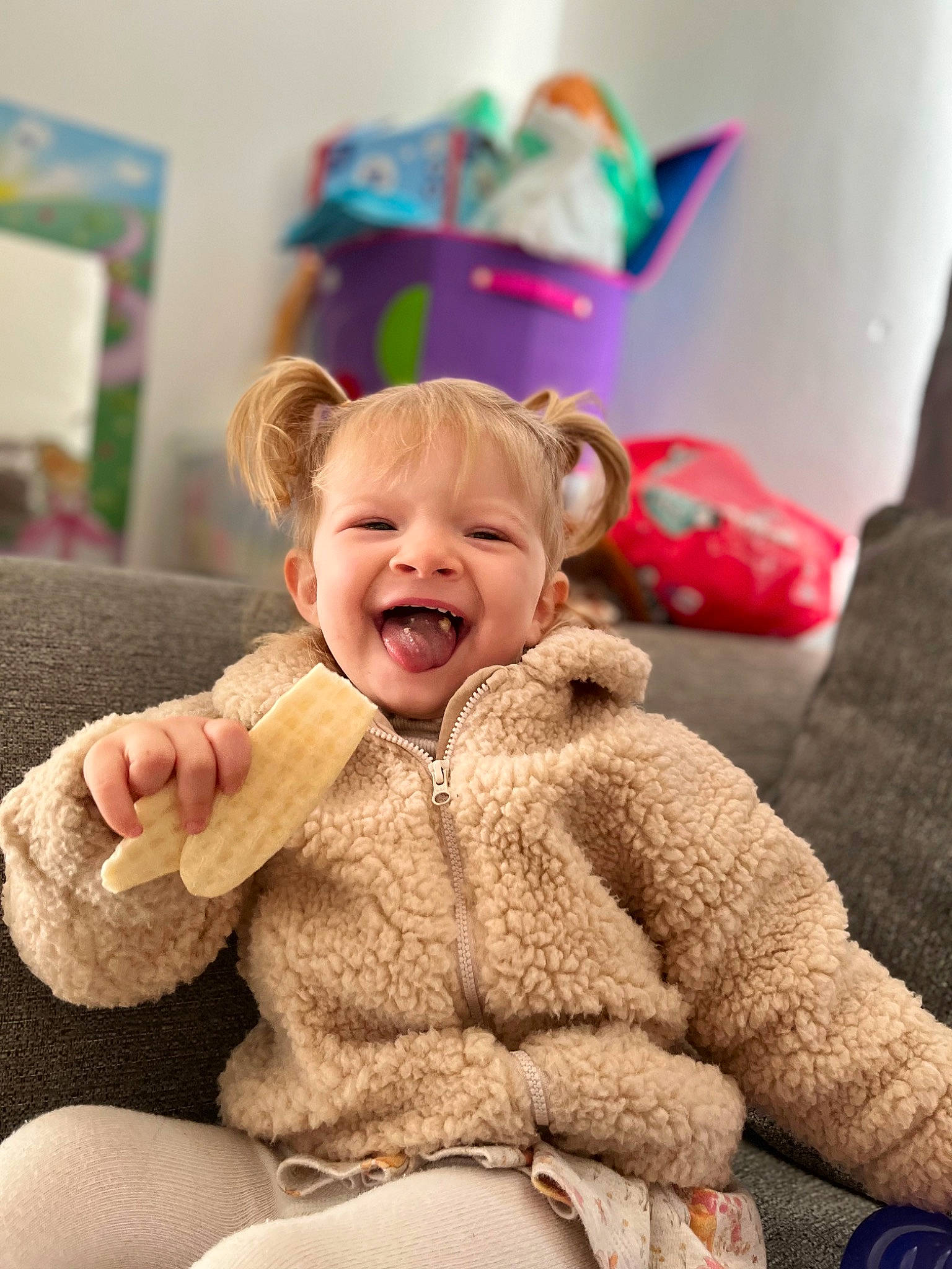 Lyla-rose is registered to the contest to win money with this photo: baby, baby_toddler_clothing, cheek, child, comfort, event, eye, fun, fur, gesture, happy, leisure, person, room, sitting, skin, sleeve, smile, toddler, wool