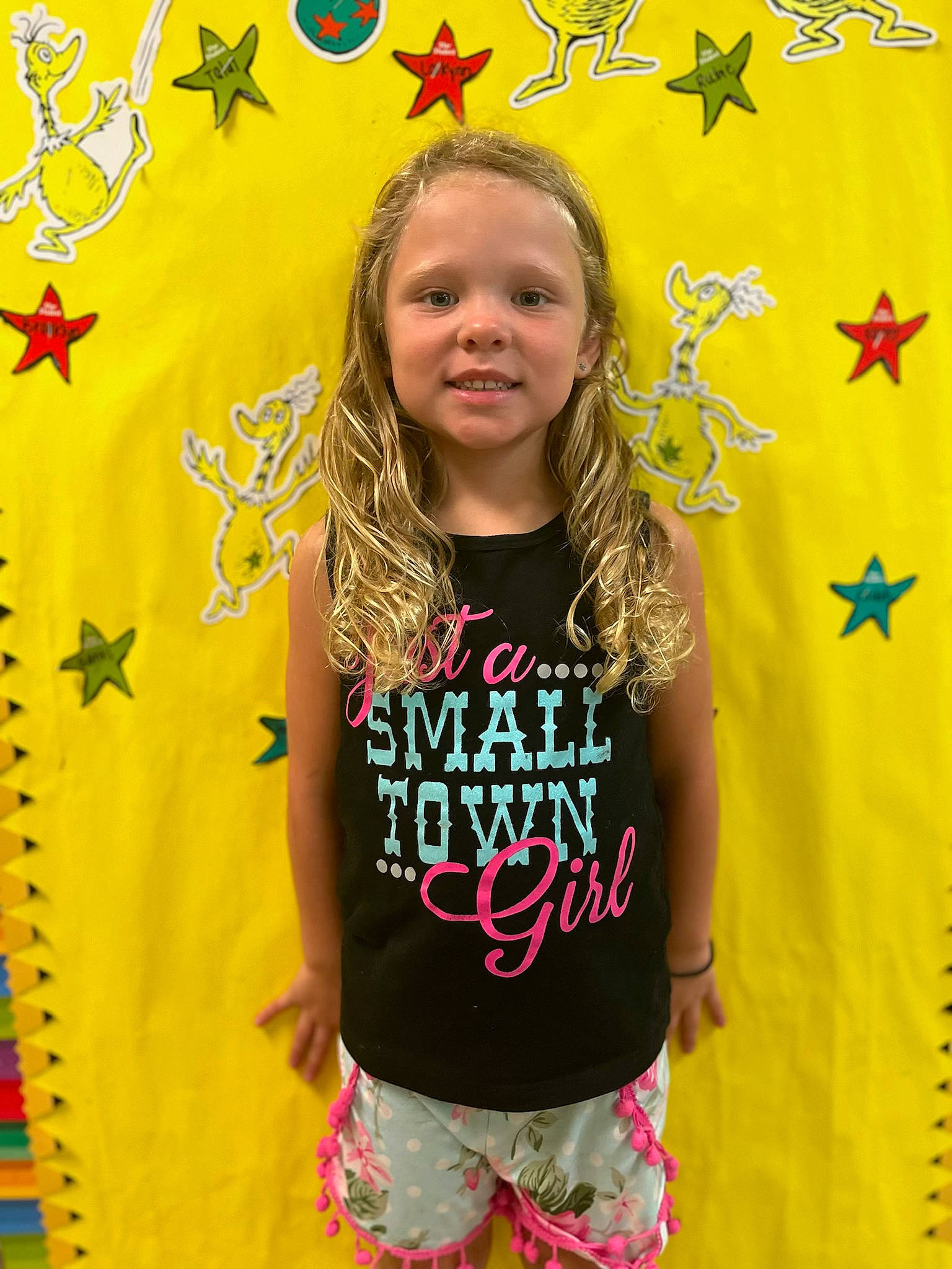 Blakelee is registered to the contest to win money with this photo: child, design, electric_blue, event, facial_expression, fashion_design, font, fun, happy, head, logo, pattern, person, shorts, sleeve, sportswear, t_shirt, textile, top, visual_arts