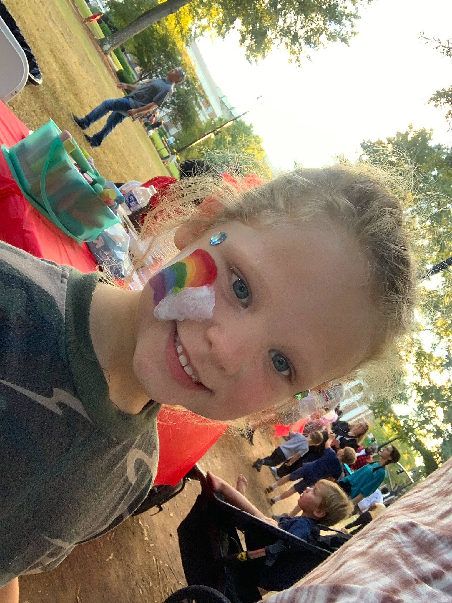 Blakelee is registered to the contest to win money with this photo: baby, child, city, eyewear, fun, grass, happy, joy, leisure, motor_vehicle, person, recreation, sitting, sky, smile, t_shirt, toddler, travel, tree, vacation