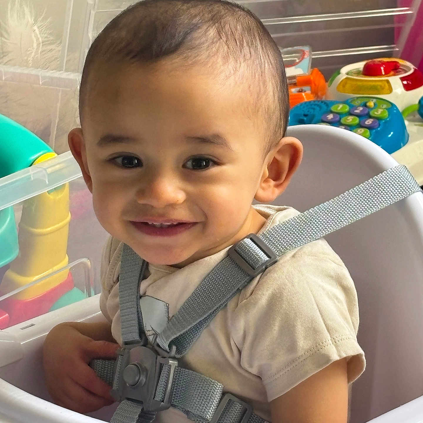 Shaam joined the competition — help win amazing prizes! baby, child, closeup, clothing, cute, face, happy, high_chair, indoor, infant, person, playtime, safety, seat, seatbelt, smiling, strap, toddler, toy, young_child