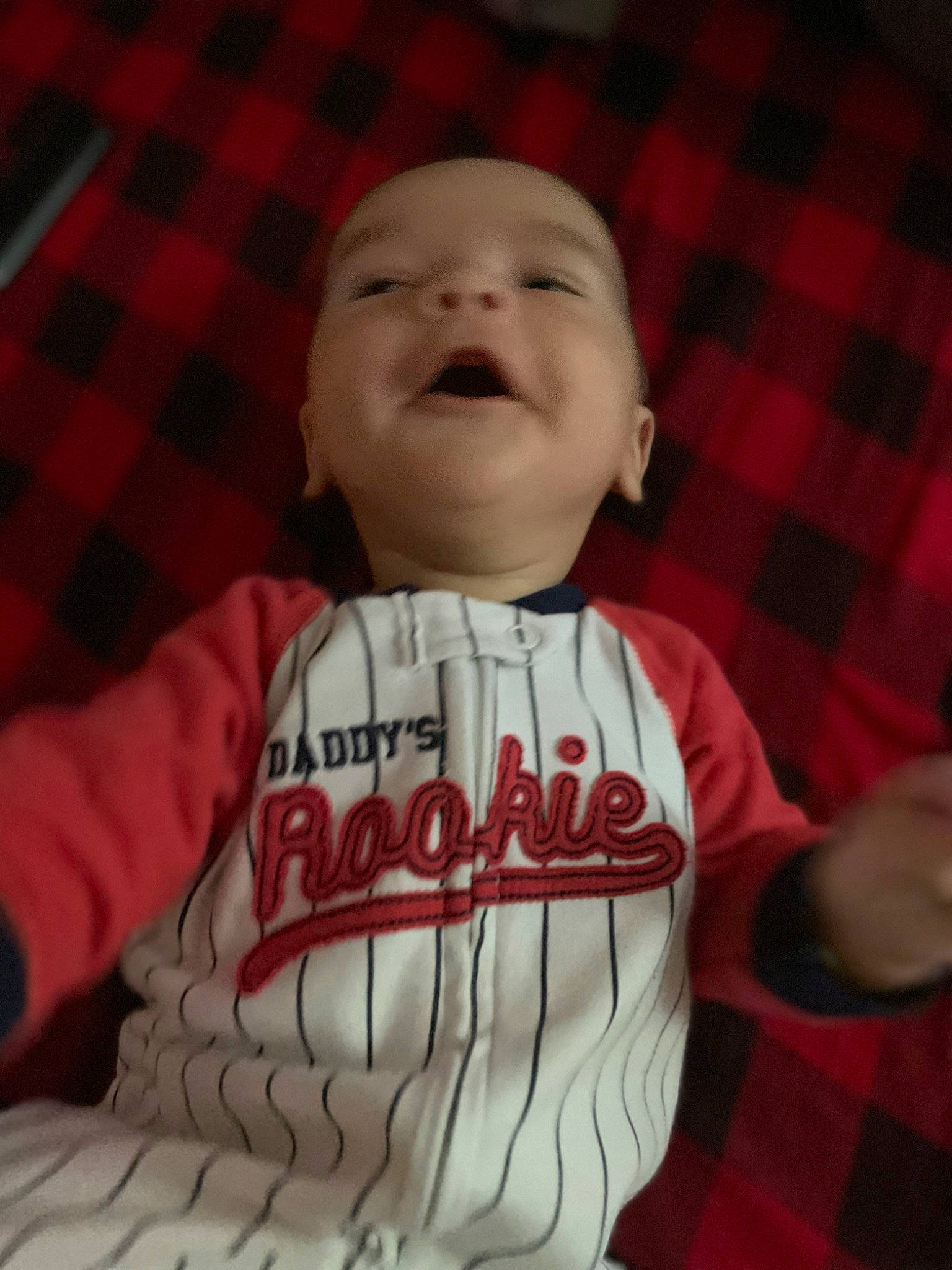 Kash joined the competition — help win amazing prizes! baby, baby_toddler_clothing, baseball, cheek, comfort, cool, finger, flooring, gesture, happy, head, jersey, mouth, nose, person, sleeve, smile, t_shirt, tartan, thumb