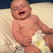 Colson joined the competition — help win amazing prizes! baby, diaper, smiling, happy, infant, bed, pillow, skin, child, cute, lying_down, indoors, sleepwear, chubby, young, person, portrait, relaxing, comfort, toddler