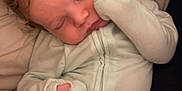 Greyson joined the competition — help win amazing prizes! baby, sleeping, infant, onesie, blanket, cozy, soft, cute, child, peaceful, newborn, face, closed_eyes, resting, pajamas, indoors, person, comfort, warm, snug