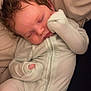 baby, sleeping, infant, onesie, blanket, cozy, soft, cute, child, peaceful, newborn, face, closed_eyes, resting, pajamas, indoors, person, comfort, warm, snug