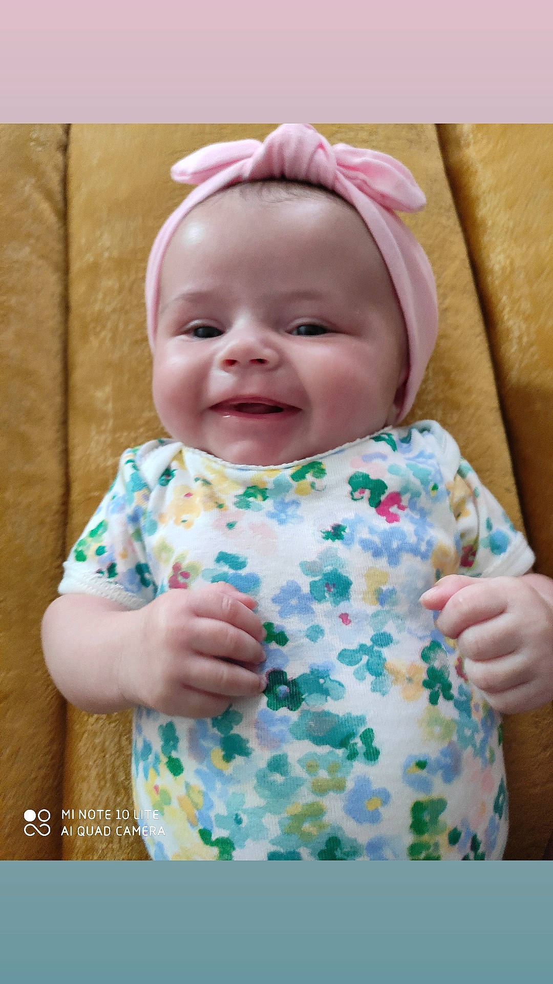 Louisa a rejoint le concours — aidez-le/la à gagner de superbes lots ! baby, baby_laughing, baby_toddler_clothing, cheek, child, comfort, dress, face, happy, head, headwear, joy, pattern, person, pink, product, room, skin, sleeve, smile