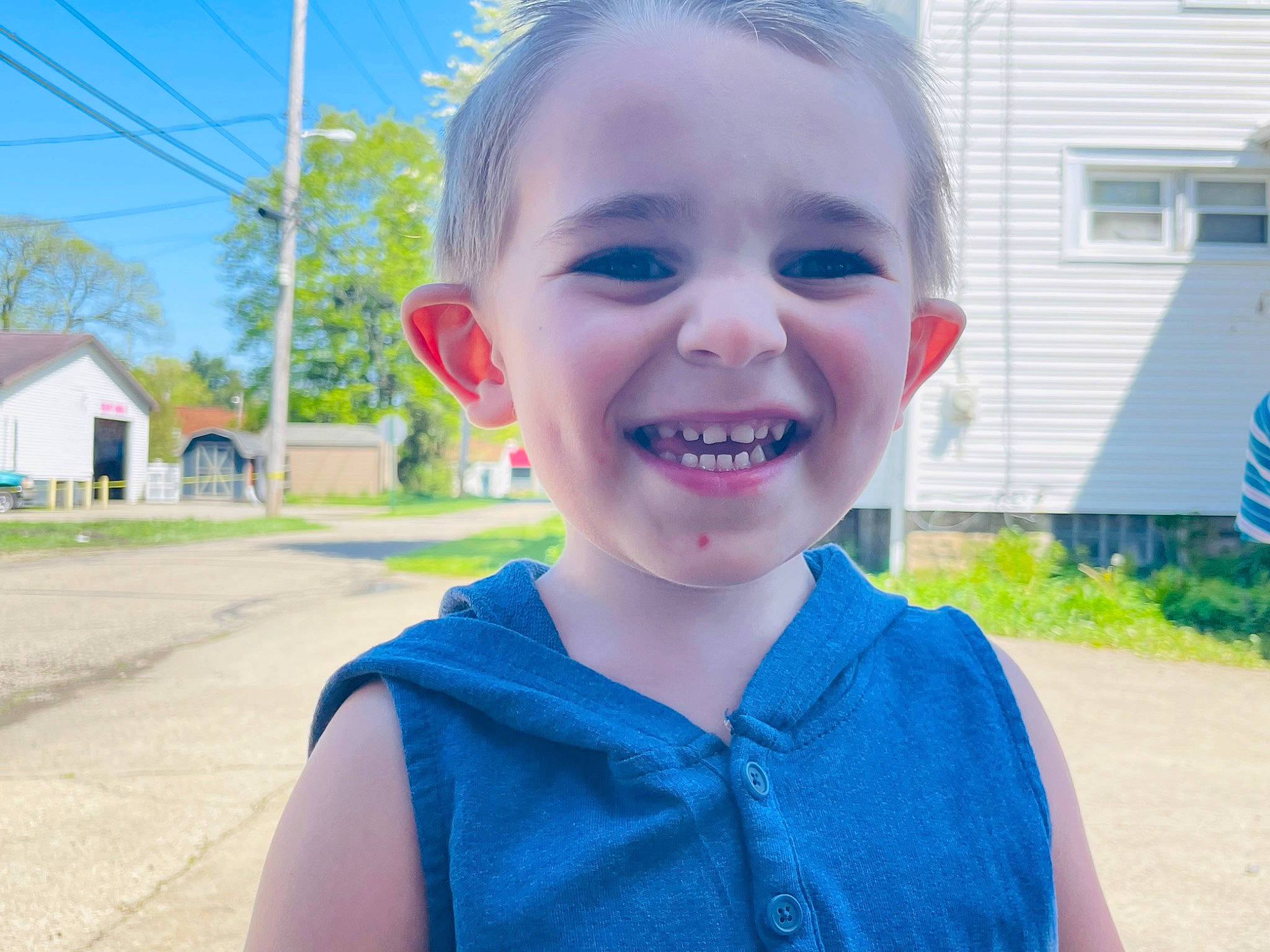 Aiden joined the competition — help win amazing prizes! blue, child, electric_blue, facial_expression, fun, grass, happy, joy, leisure, lip, mouth, nose, person, plant, sky, sleeve, smile, standing, summer, toddler