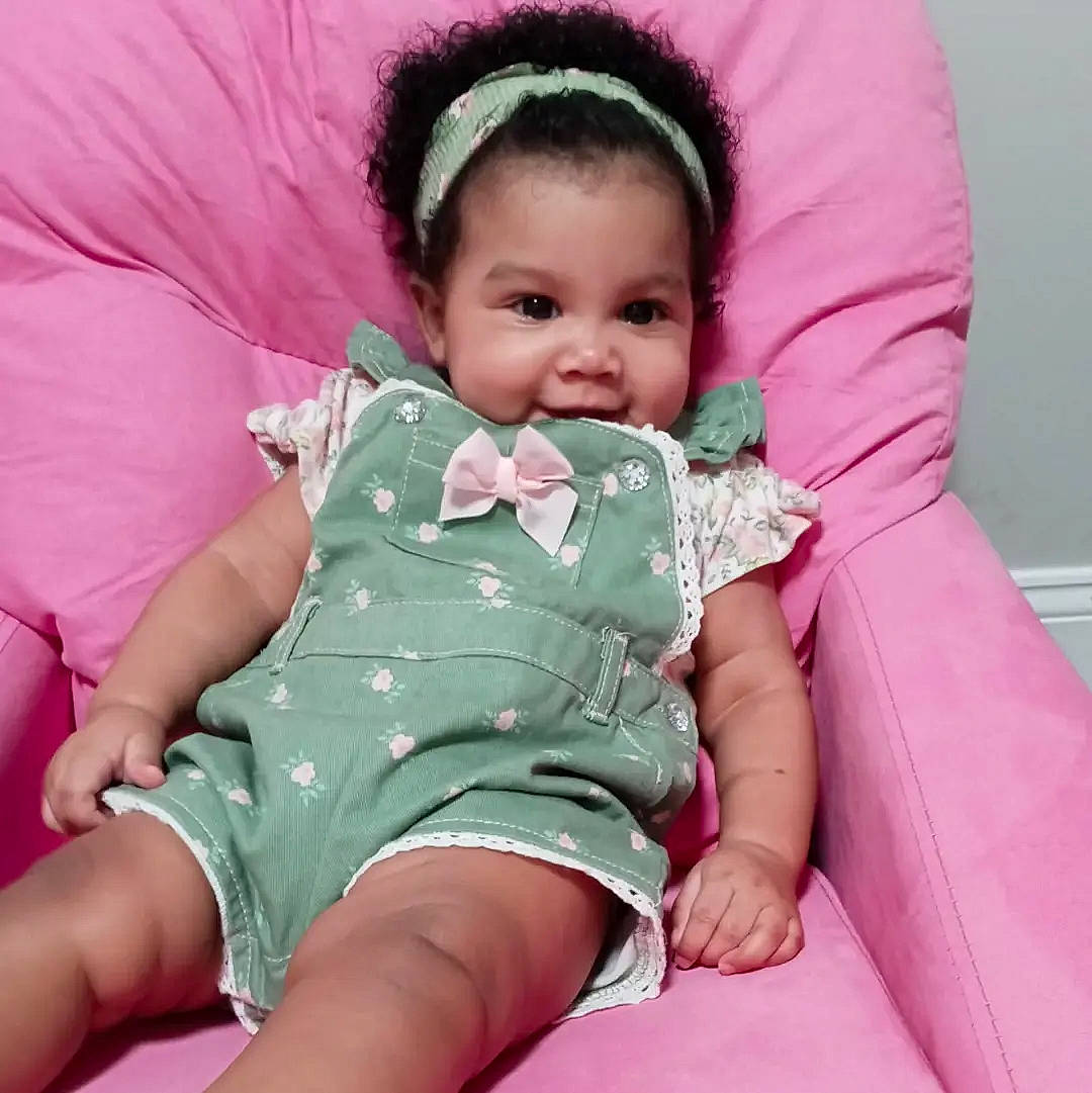 Sahara joined the competition — help win amazing prizes! baby, baby_toddler_clothing, cheek, child, comfort, facial_expression, finger, fun, happy, lap, magenta, organ, person, pink, product, skin, sleeve, smile, textile, thigh