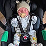 Jonyk is registered to the contest to win money with this photo: baby, sleeping, car_seat, pacifier, hat, bear_ears, clothing, socks, patterned_pants, infant, child, seatbelt, black_car_seat, wooden_floor, cute, newborn, resting, indoors, cozy, toddler
