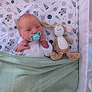 Jonyk joined the competition — help win amazing prizes! newborn, baby, pacifier, blanket, plush_toy, bunny, crib, bed, sleeping, infant, swaddled, cute, child, space_theme, rocket, stars, planets, pattern, fabric, soft