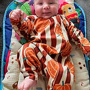 Jonyk joined the competition — help win amazing prizes! baby, child, colorful, cozy, cushioned_mat, cute, face, fist, floor, foot, happy, head, indoor, infant, lying_down, onesie, playmat, pumpkin_pattern, smiling, soft_texture