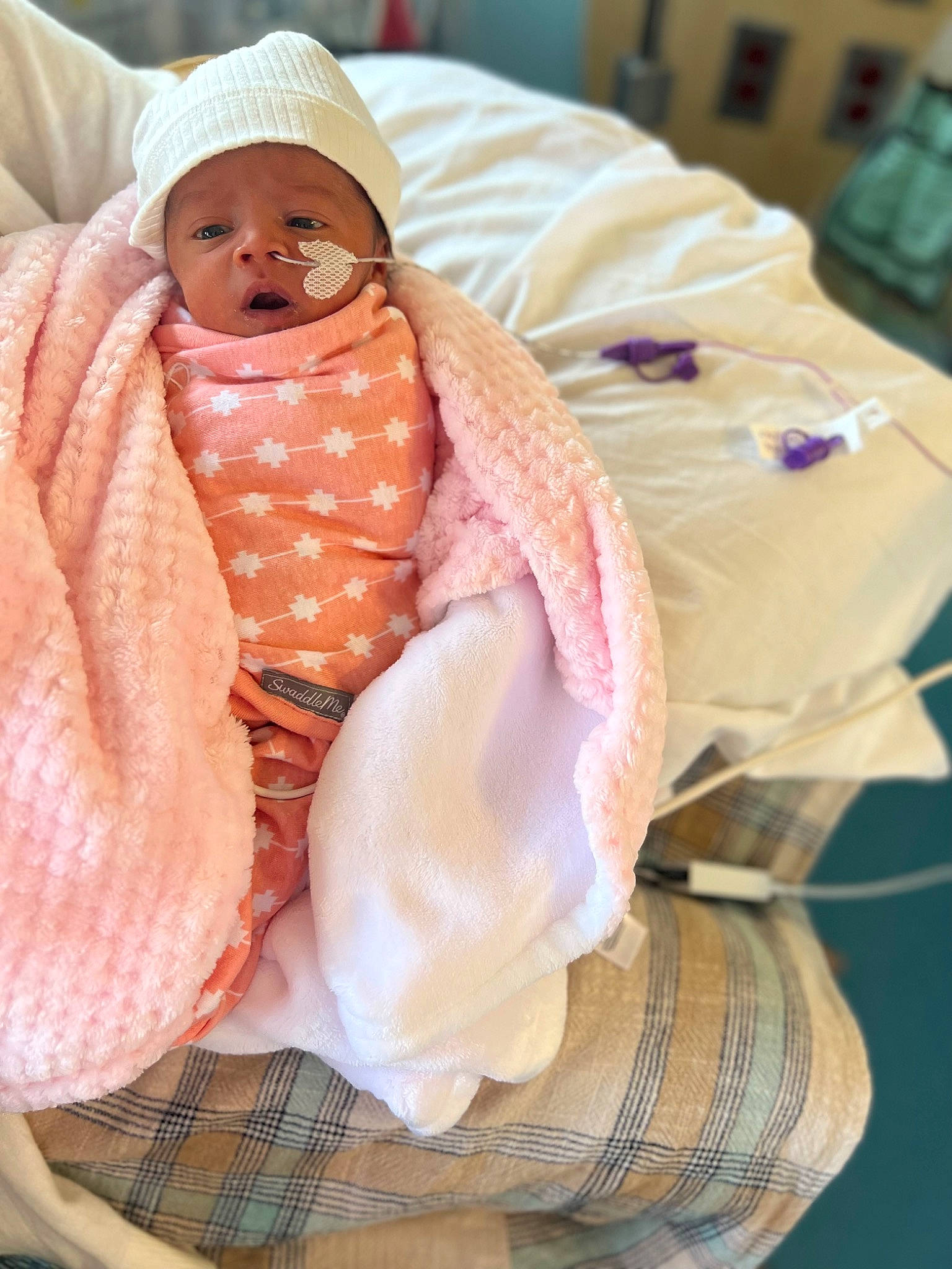 Elena joined the competition — help win amazing prizes! baby, baby_products, baby_safety, baby_sleeping, baby_toddler_clothing, beanie, cheek, child, comfort, face, headwear, knit_cap, linens, pattern, peach, person, pink, sleeve, tartan, thumb
