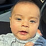 Asvel Navarrete is registered to the contest to win money with this photo: baby, infant, face, close_up, onesie, clothing, hand, car_interior, seat, sunlight, cute, child, portrait, skin, expression, person, eyebrows, nose, mouth, head