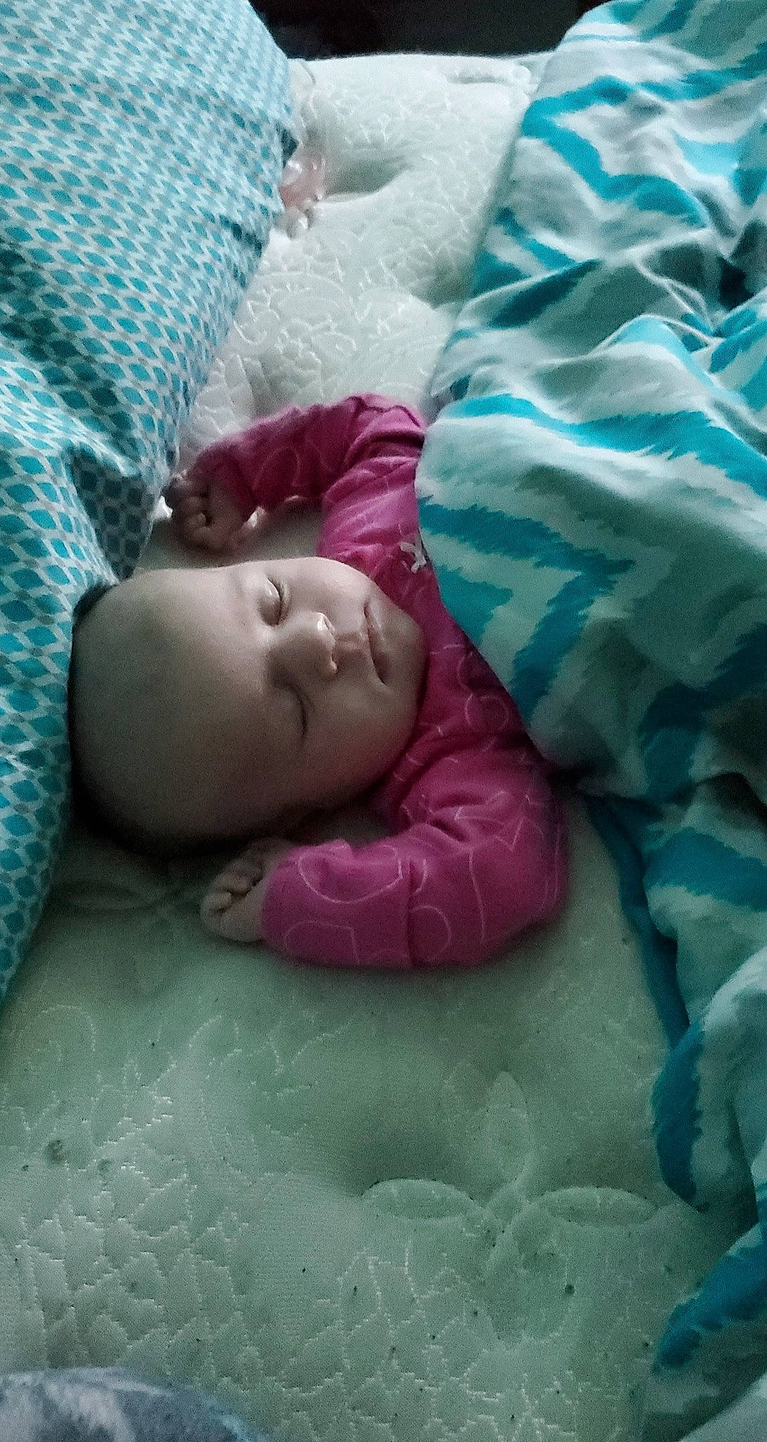 Chevelle is registered to the contest to win money with this photo: baby, bedtime, birth, child, nap, person, pink, room, sleep, textile, toddler